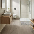 Nordic Oak LVT click flooring installed in modern bathroom, light natural oak wood effect vinyl flooring UK