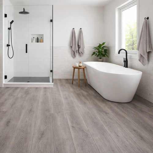 Grey Oak LVT click flooring installed in modern bathroom, grey wood effect vinyl flooring UK